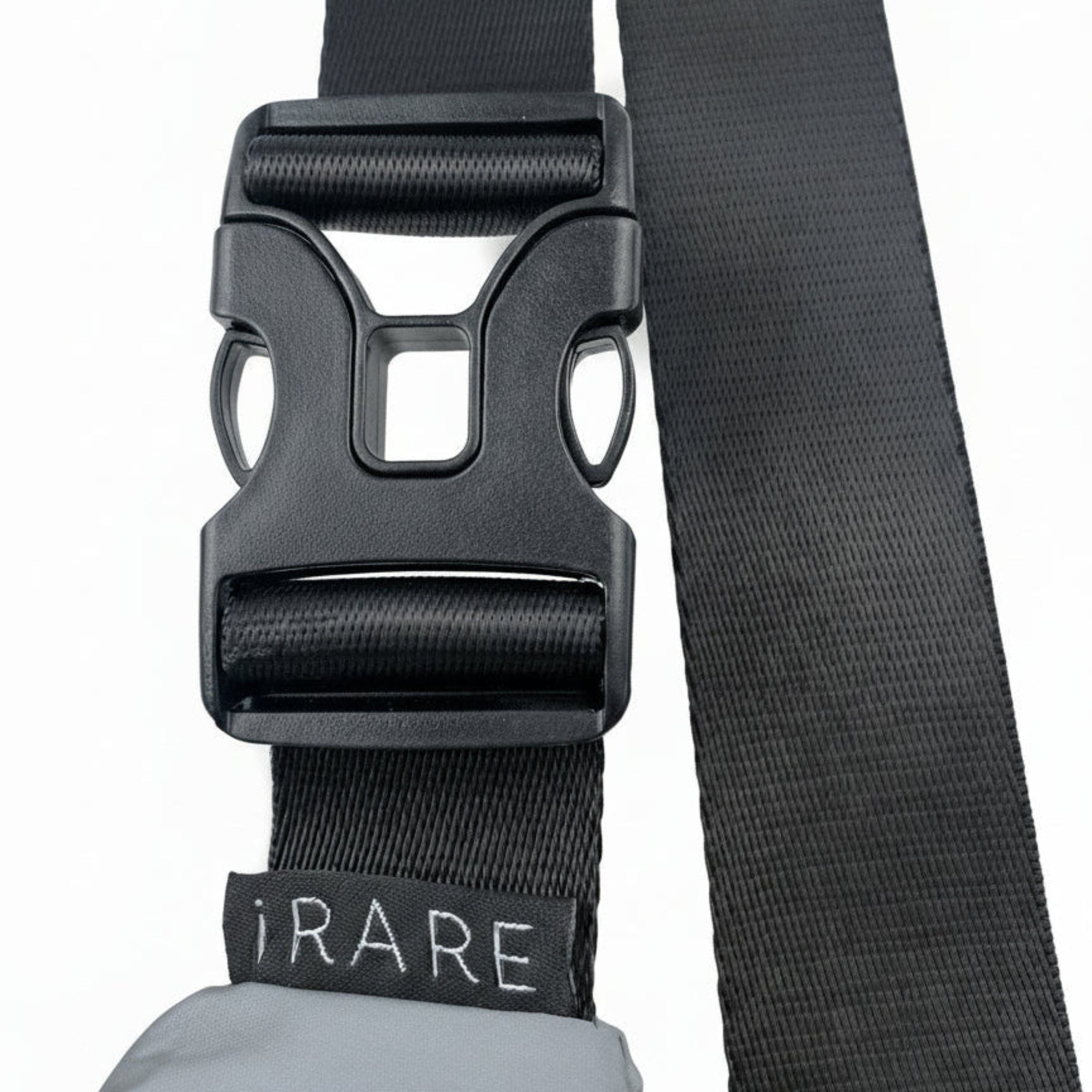 Close-up of large crossbody sport bag buckle and strap detail
