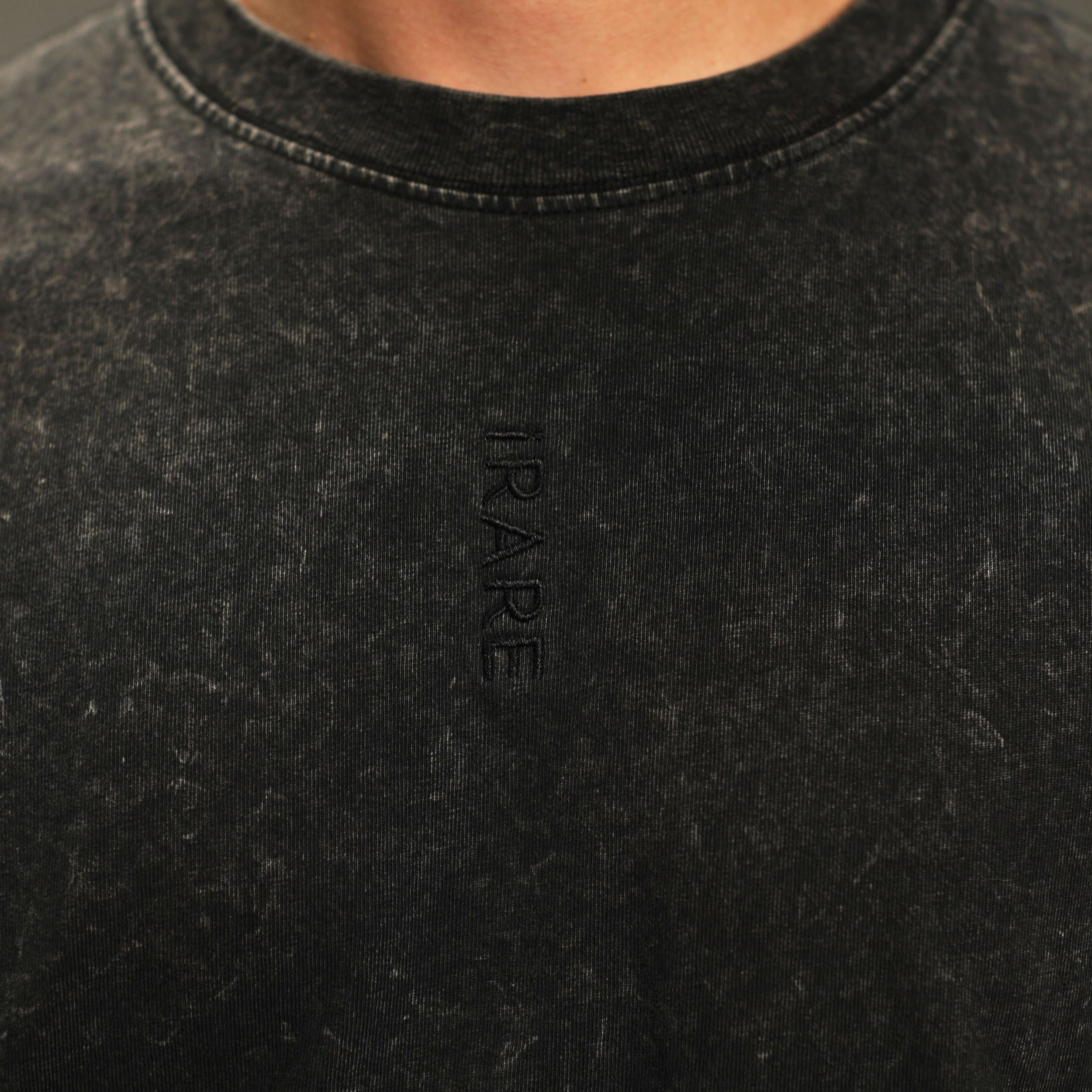 iRARE men’s acid-washed t-shirt in washed black, close up