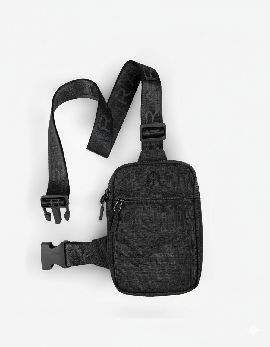 Black crossbody bag with front zip pocket and woven adjustable strap