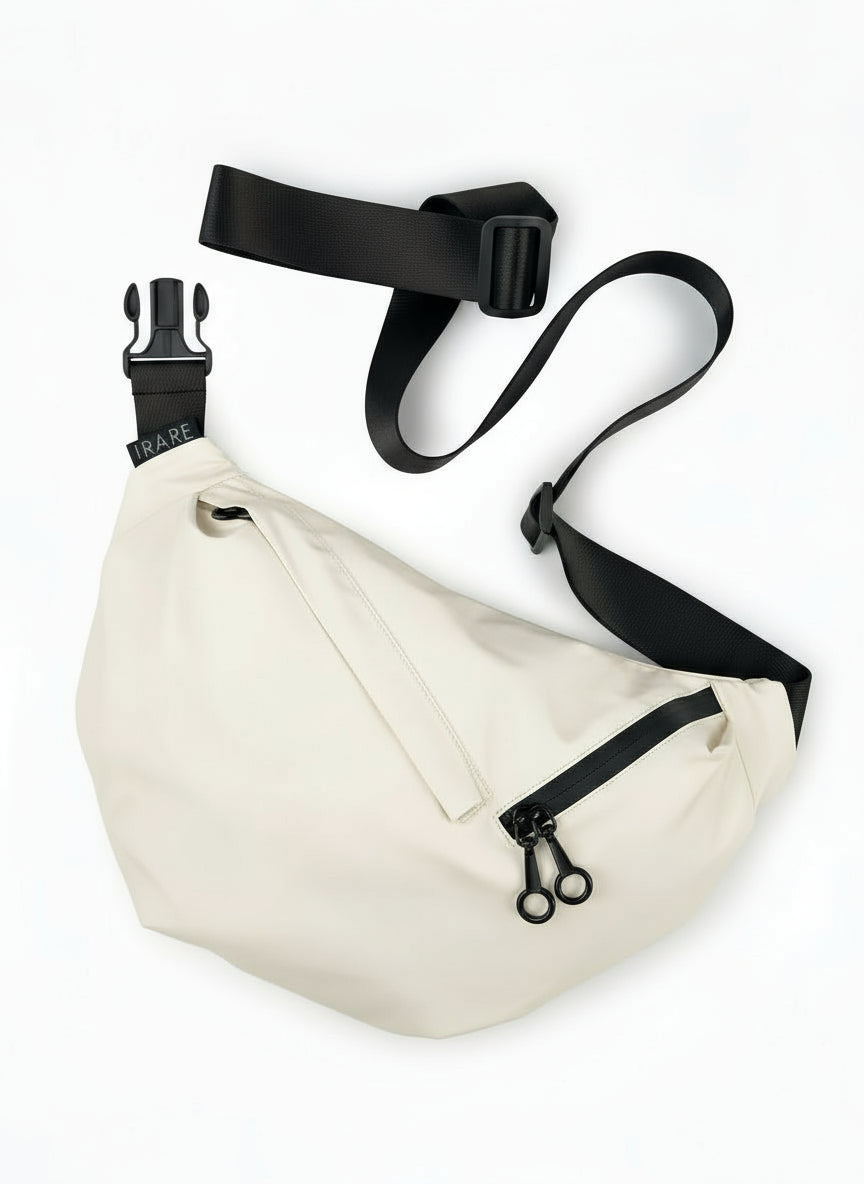 large crossbody sport bag in cream, front product view