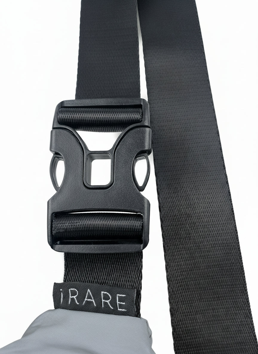 Close-up of large crossbody sport bag buckle and strap detail