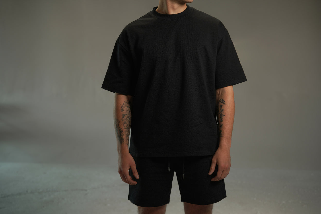 men’s relaxed sweat shorts in black, front alt pose
