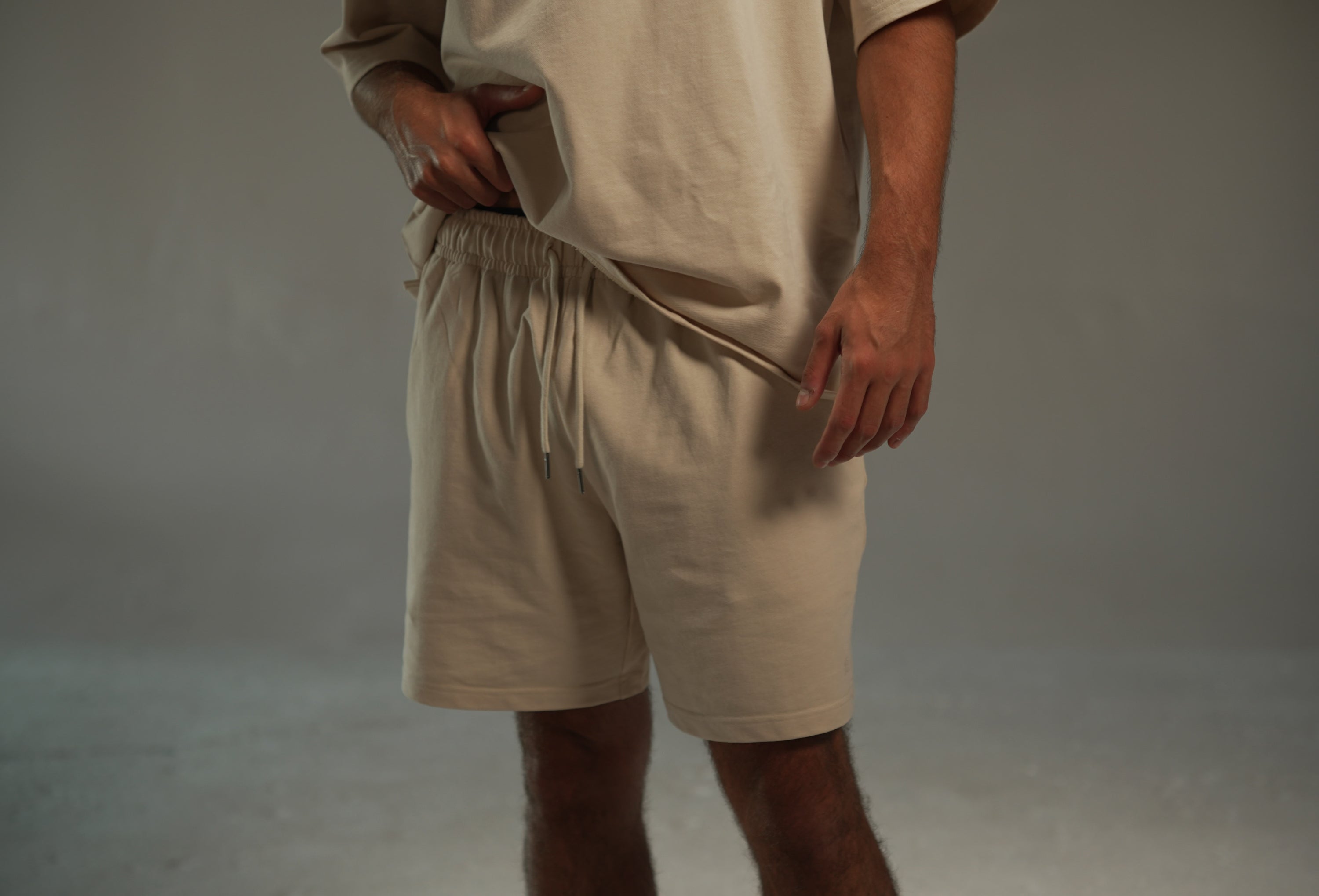 men’s relaxed sweat shorts in khaki, on-model front