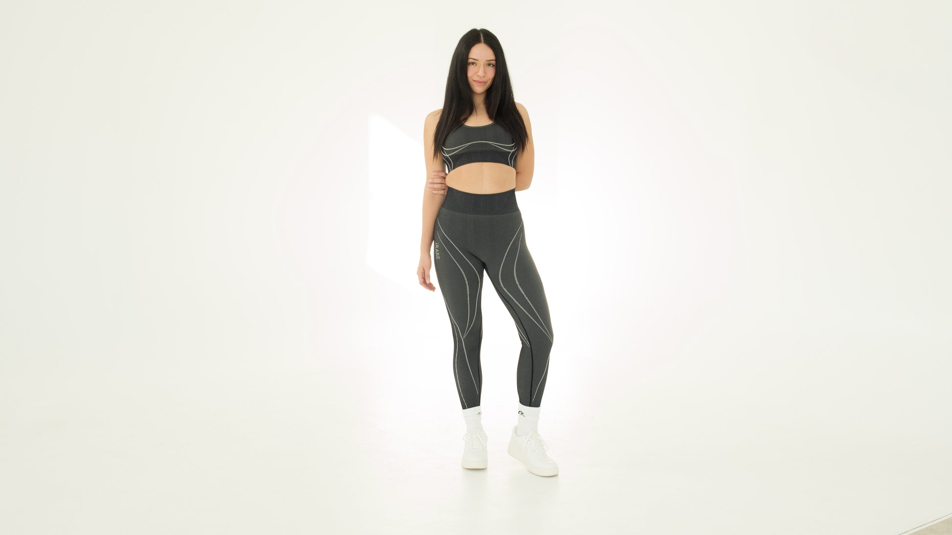 black seamless leggings, studio front view on model