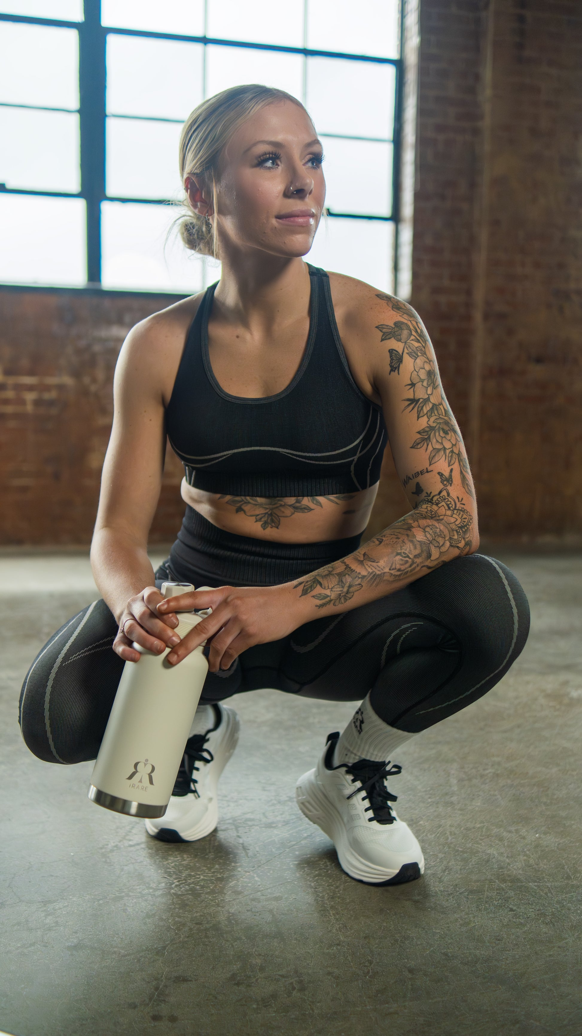 seamless sports bra in black, on-model front, alt pose