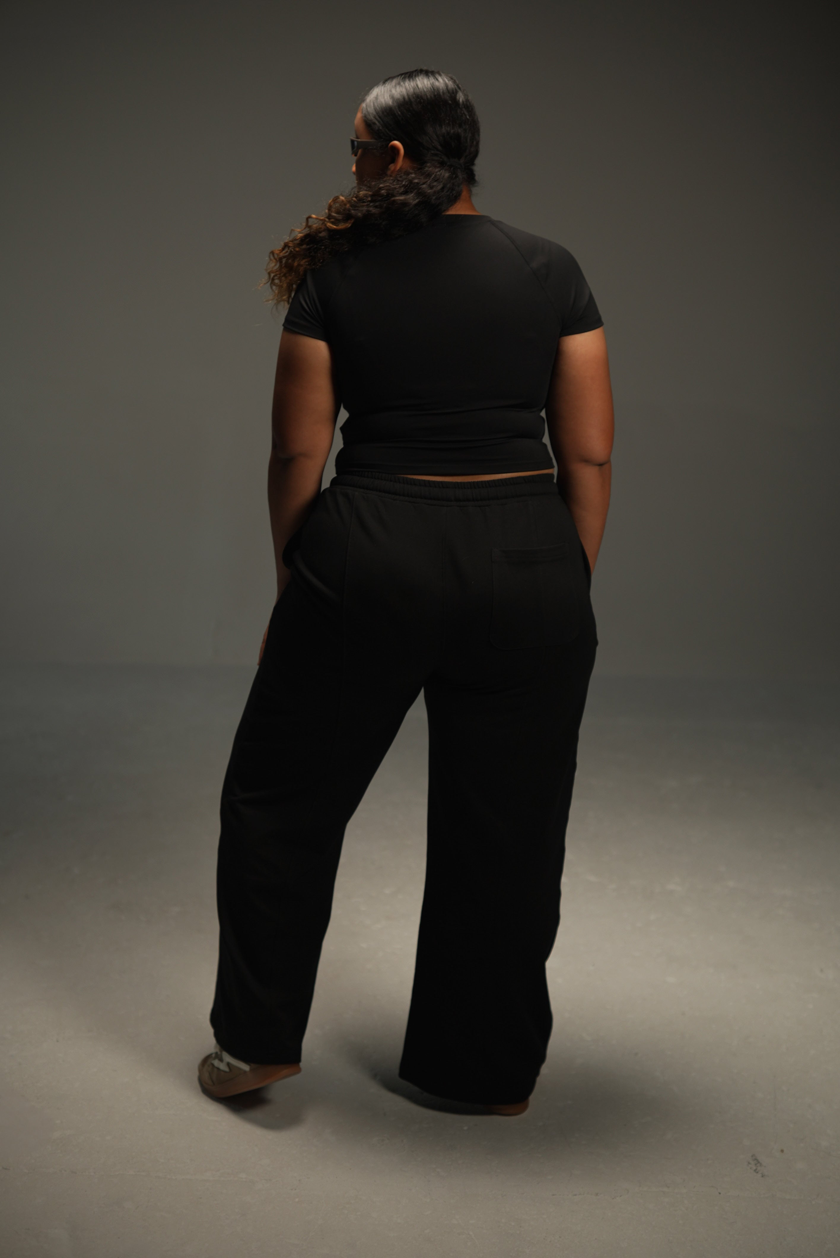 short-sleeve raglan top in black, on-model back