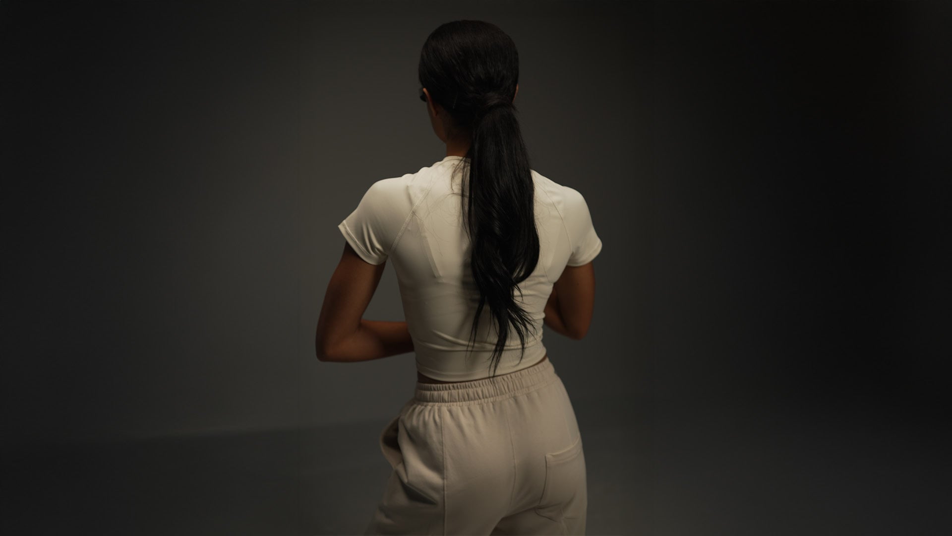 short-sleeve raglan top in khaki, on-model back