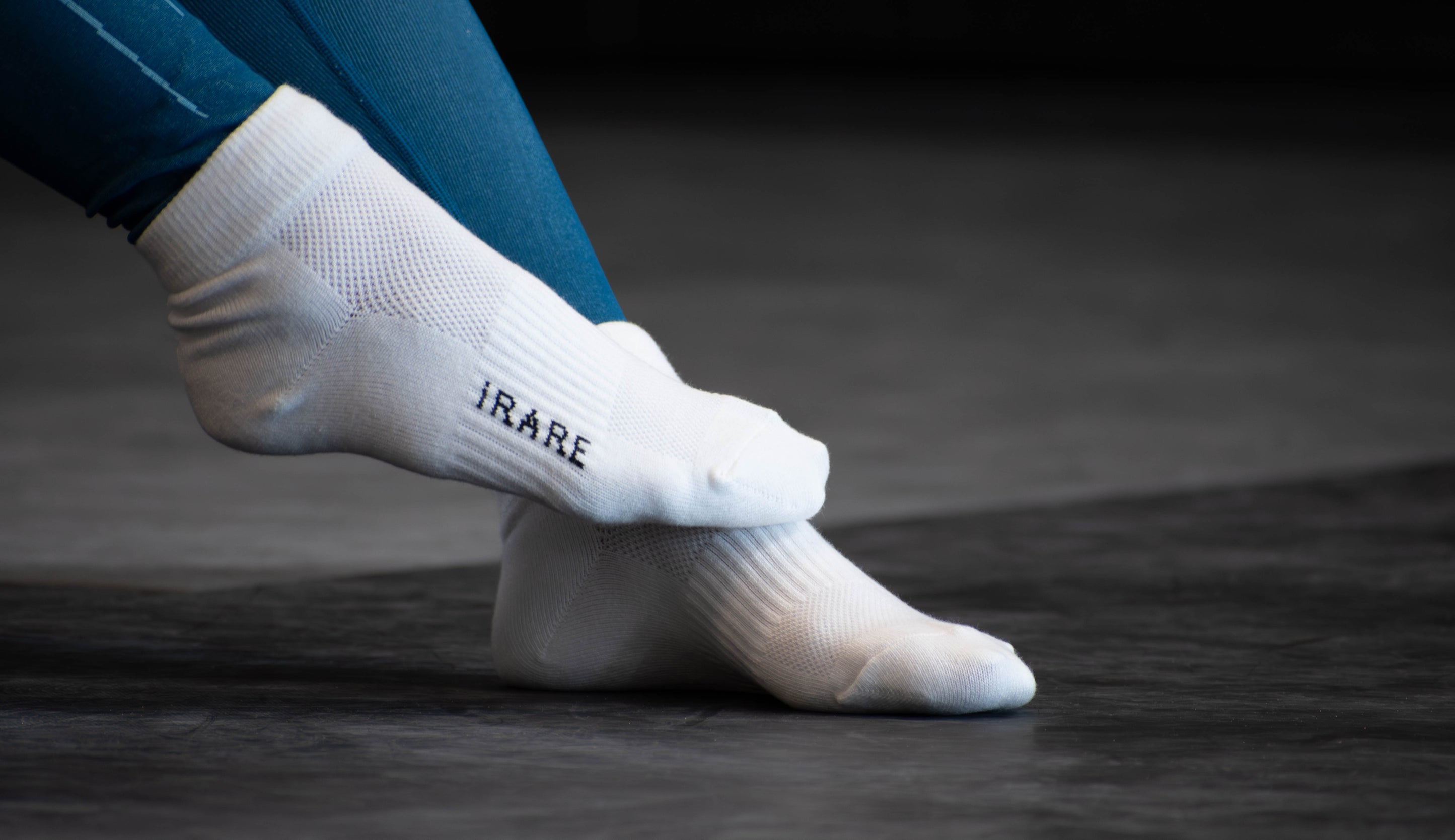 unisex ankle socks in white, gym floor