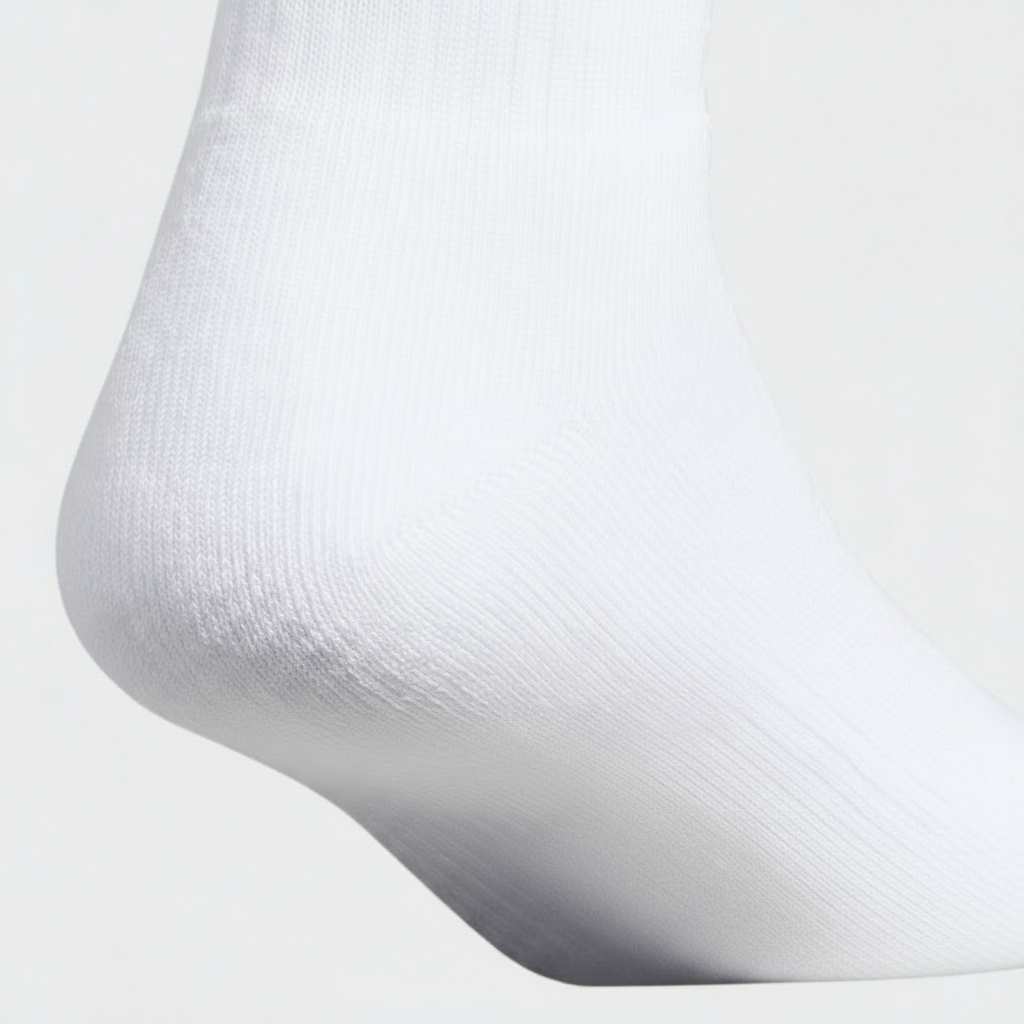 Close-up of unisex white crew socks heel showing ribbed knit texture