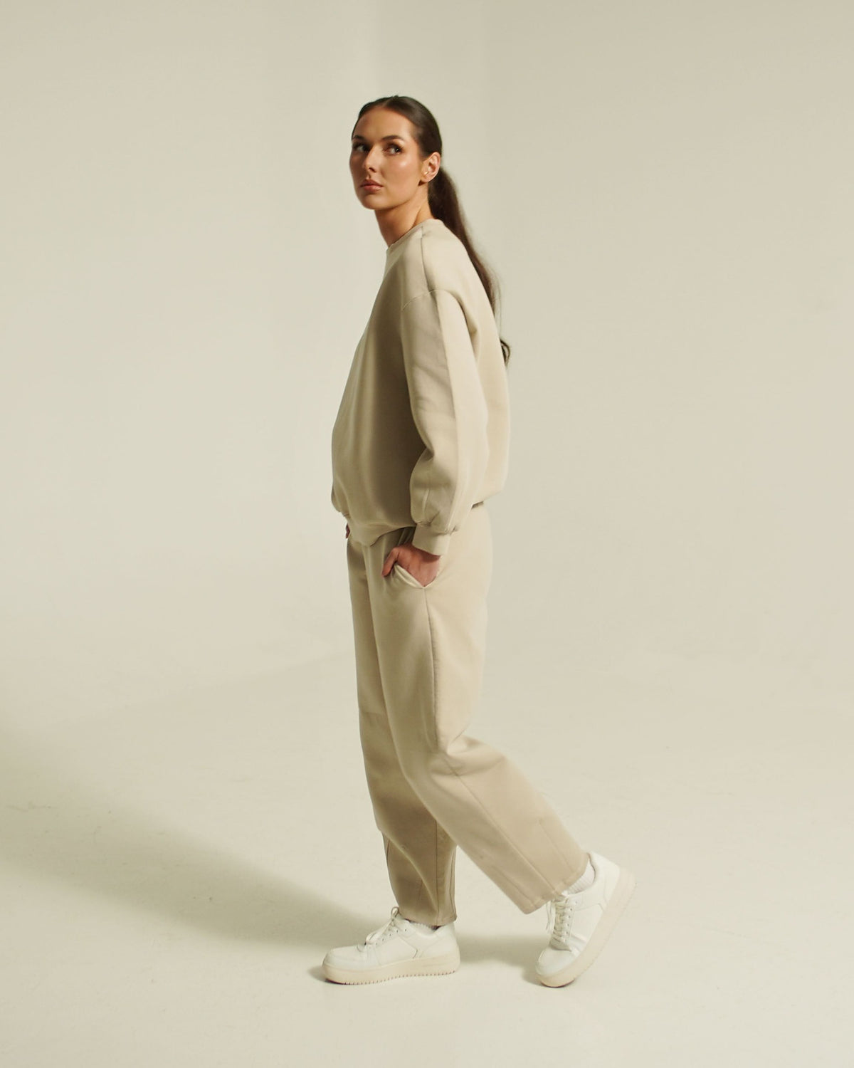 women’s FORM crew neck sweatshirt light taupe side view
