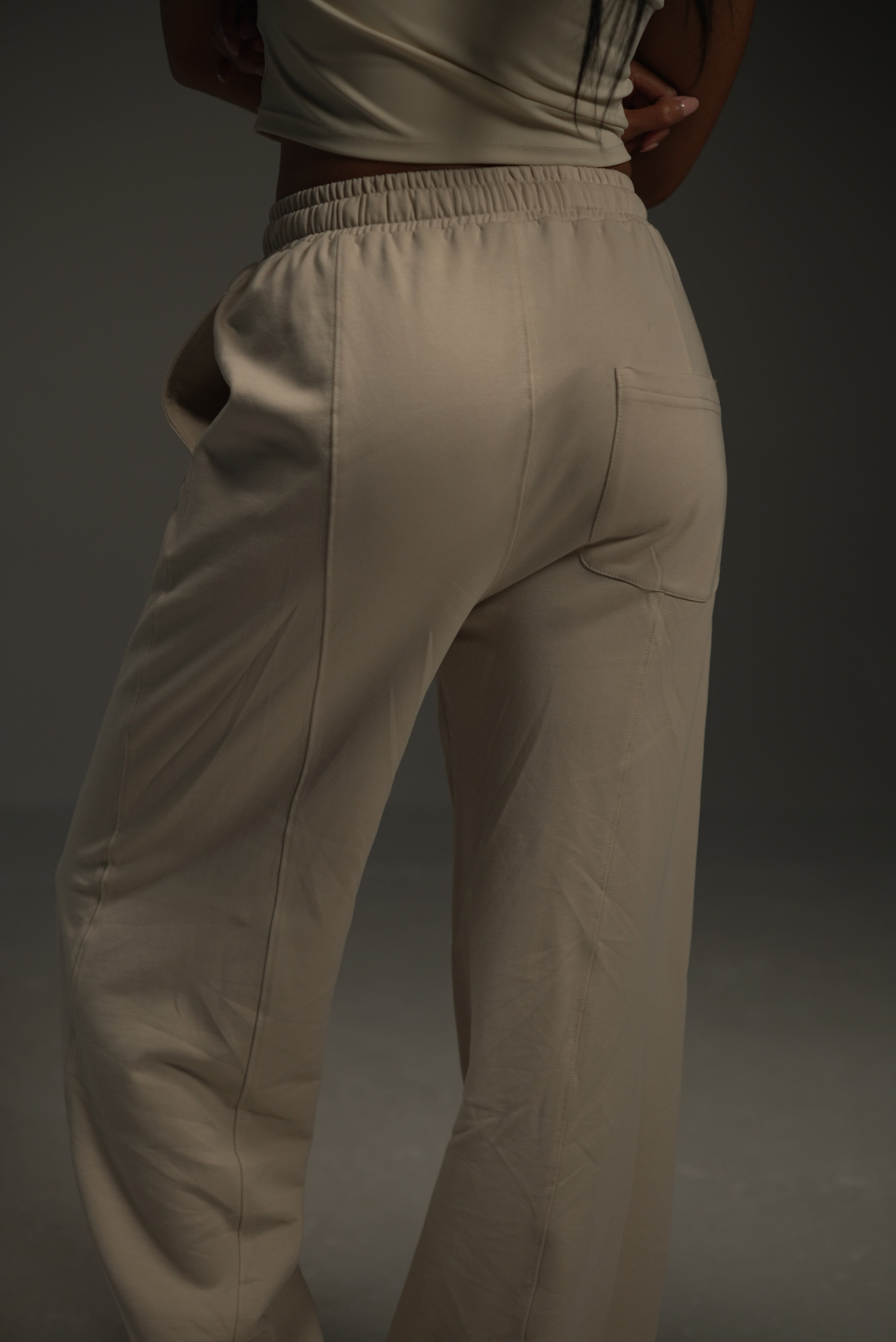khaki wide-leg sweatpants, back view close-up