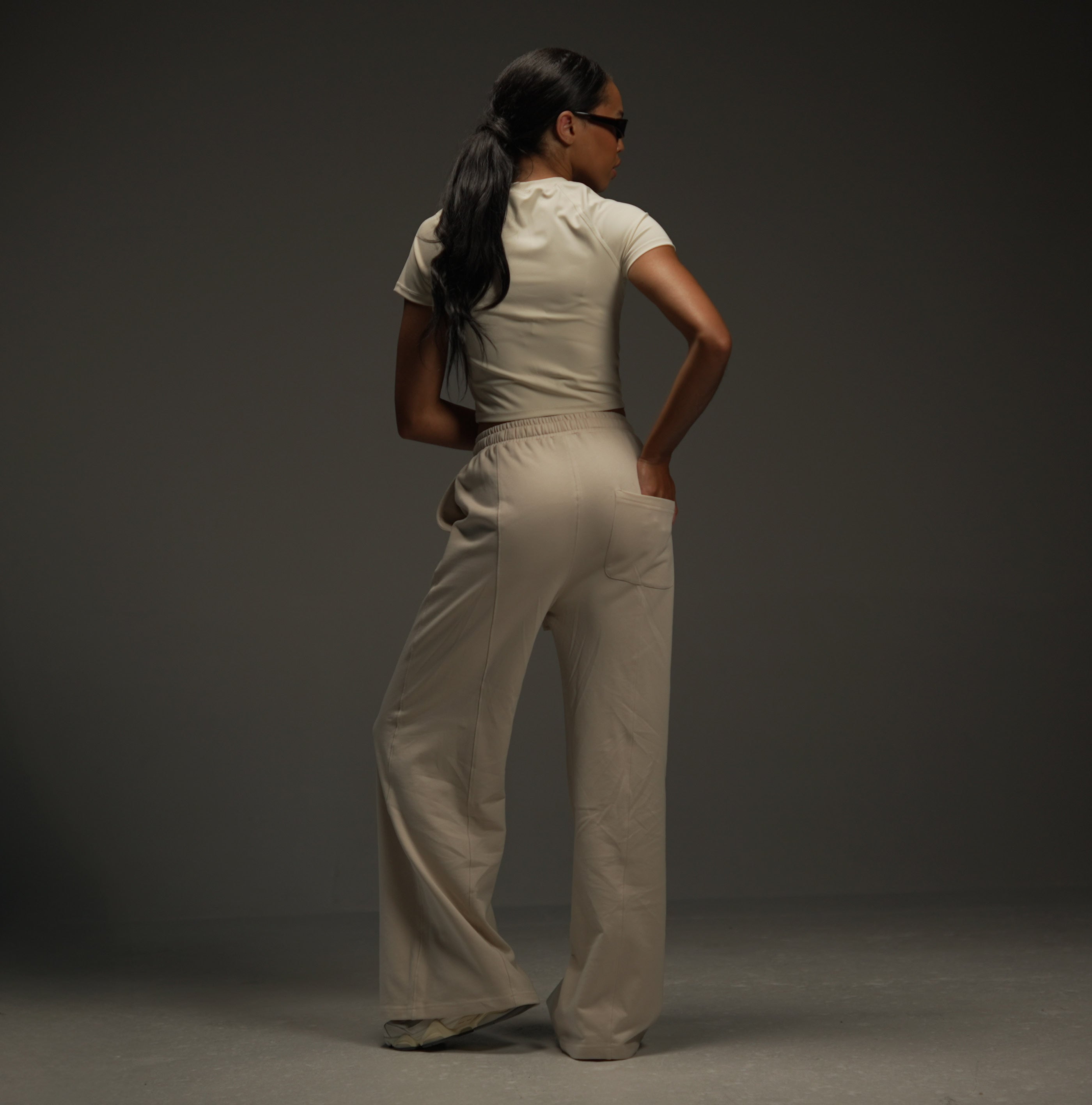 wide-leg sweatpants in khaki, on-model back, full length